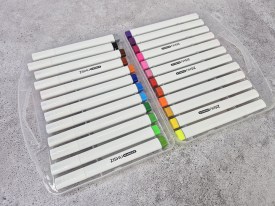 Pack 24 marcadores triangulares punta pincel valija plastica
